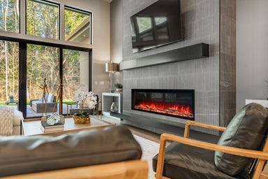 modern flames landscape pro slim smart electric fireplace installed in living room with large windows