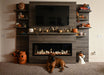 modern flames allwood fireplace wall system for modern flames spectrum slimline 60" electric fireplace installed in living room with halloween decorations all around it and a dog laying in front of it