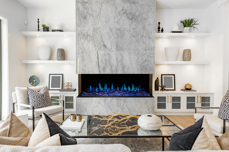 Modern flames orion multi built in or wall mounted smart electric fireplace with real flame effects with blue flames installed in a common area in a home