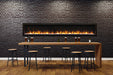 amantii built-in slim smart electric fireplace installed in a bar