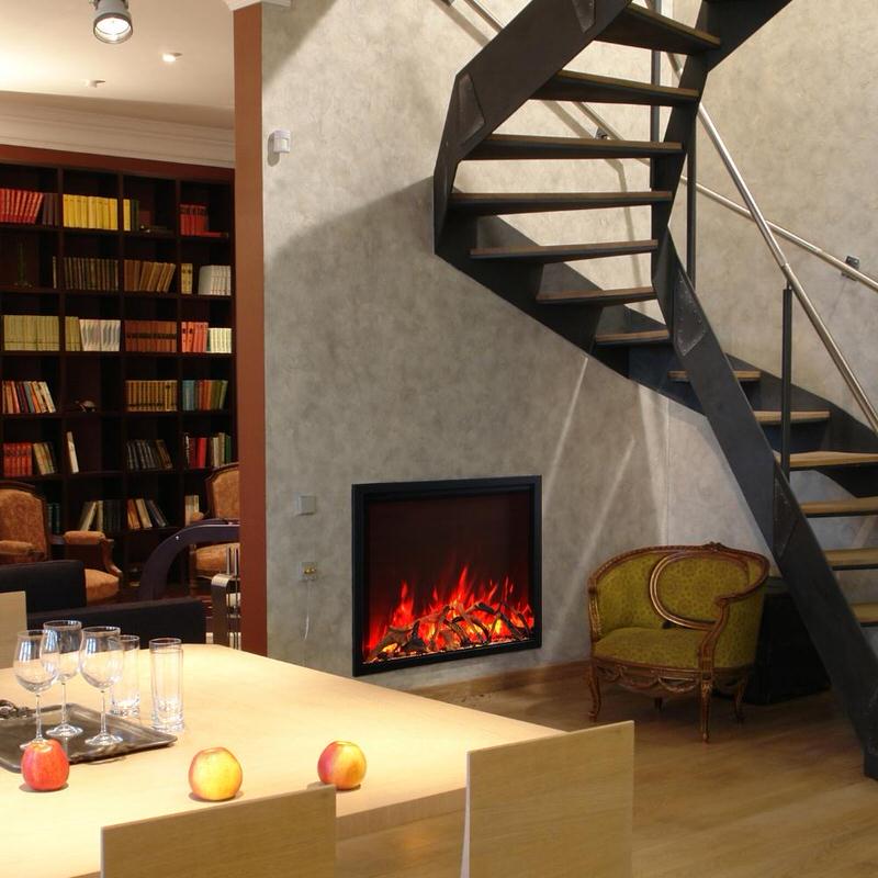 amantii traditional built-in electric fireplace insert installed underneath spiral stair case in dining room