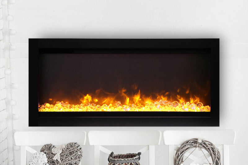 amantii symmetry series recessed/wall-mount smart electric fireplace with glass media and yellow flames 