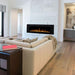 modern flames challenger series recessed electric fireplace installed in a modern living room in a white tile fireplace