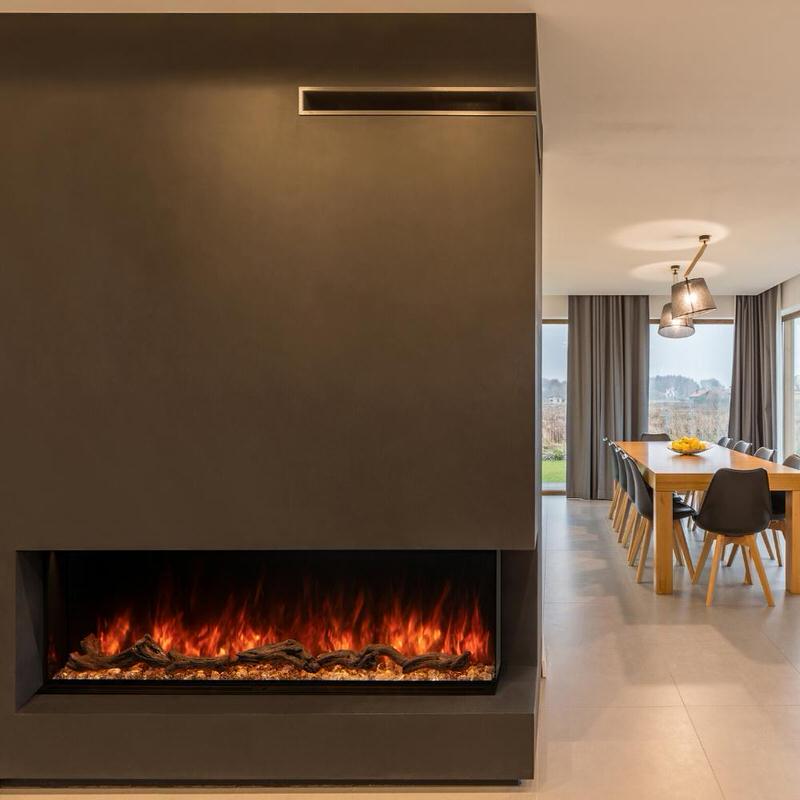 modern flames landscape pro multi 3 sided smart electric fireplace installed in a modern dining room 
