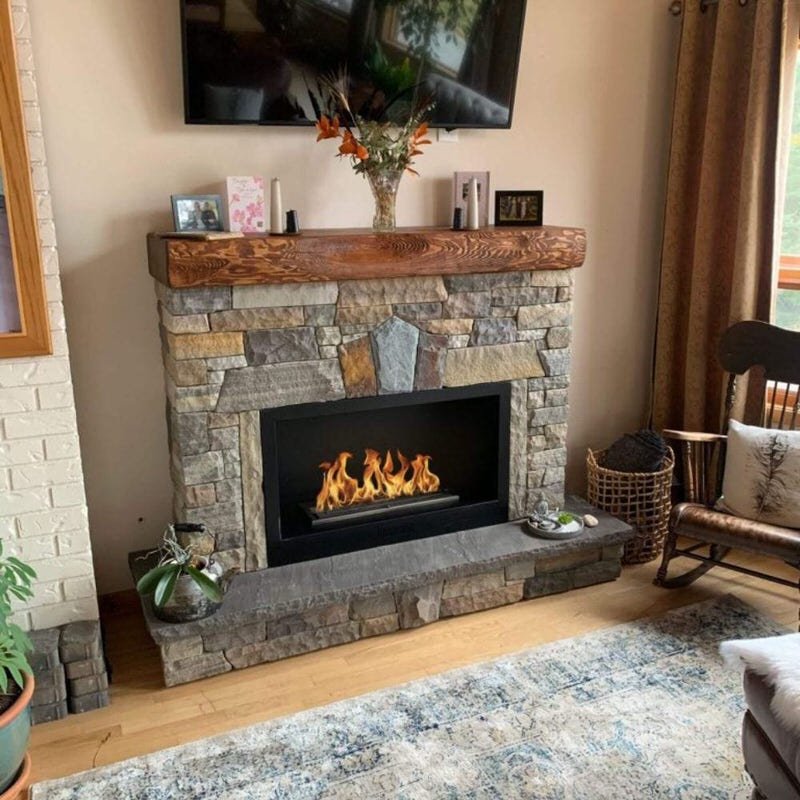 the bio flame 38-inch firebox SS installed in a fireplace