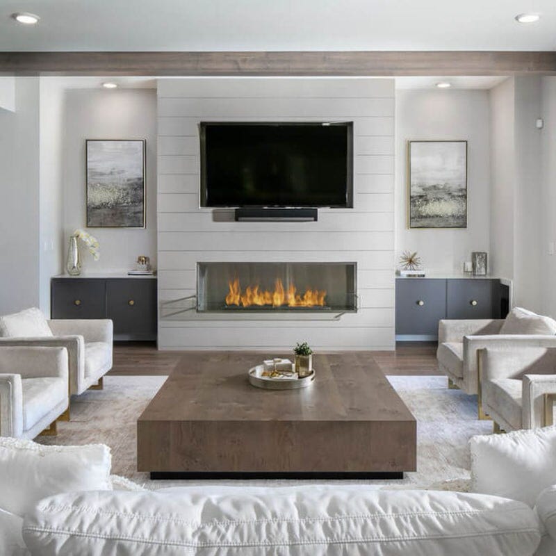 the bio flame 72-inch single sided built-in ethanol burner fireplace installed in a luxury living room with large coffee table