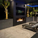 the bio flame 72-inch single sided built-in ethanol burner fireplace installed in an outdoor patio setting 