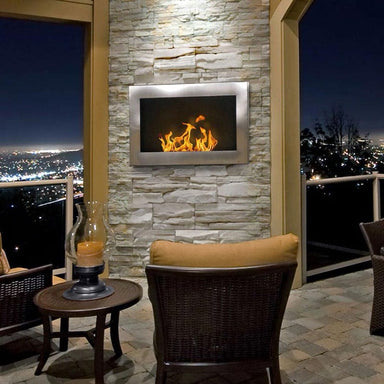 The bio flame fiorenzo 33-inch built in or wall mounted ethanol fireplace  installed in outdoor patio area