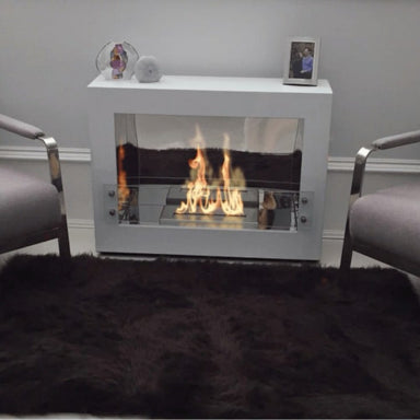 the bio flame rogue 2.0 single sided 36-inch ethanol fireplace installed in living room in white finish