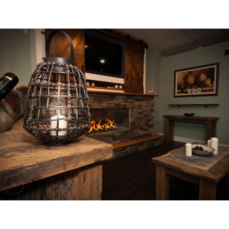 The bio flame XL SS firebox installed in a rustic living room